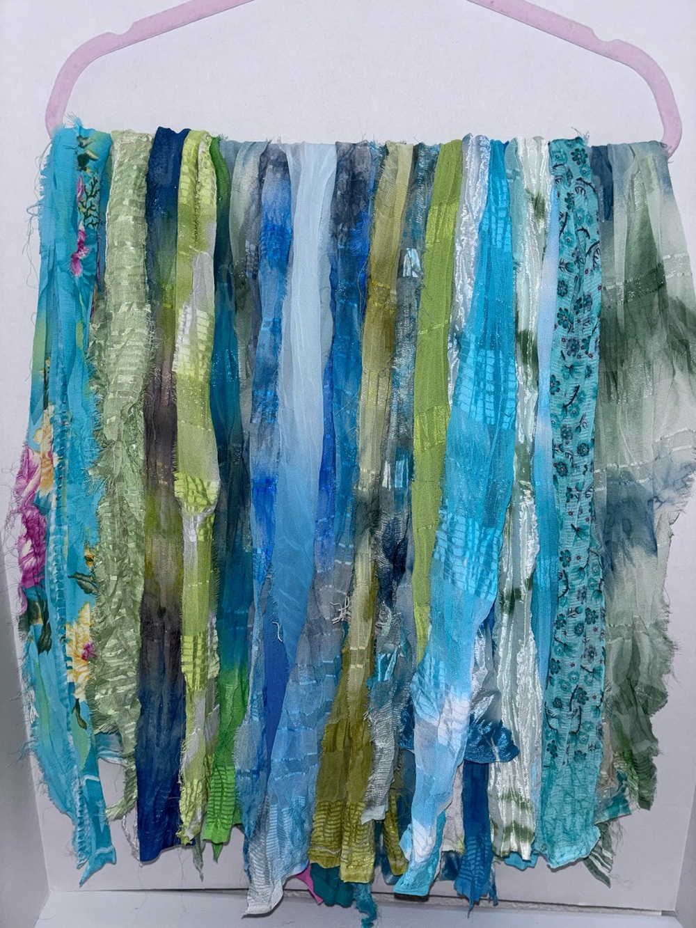 Vibrant sari silk fabric strands in blue/green hues.Junk journal sewing.
